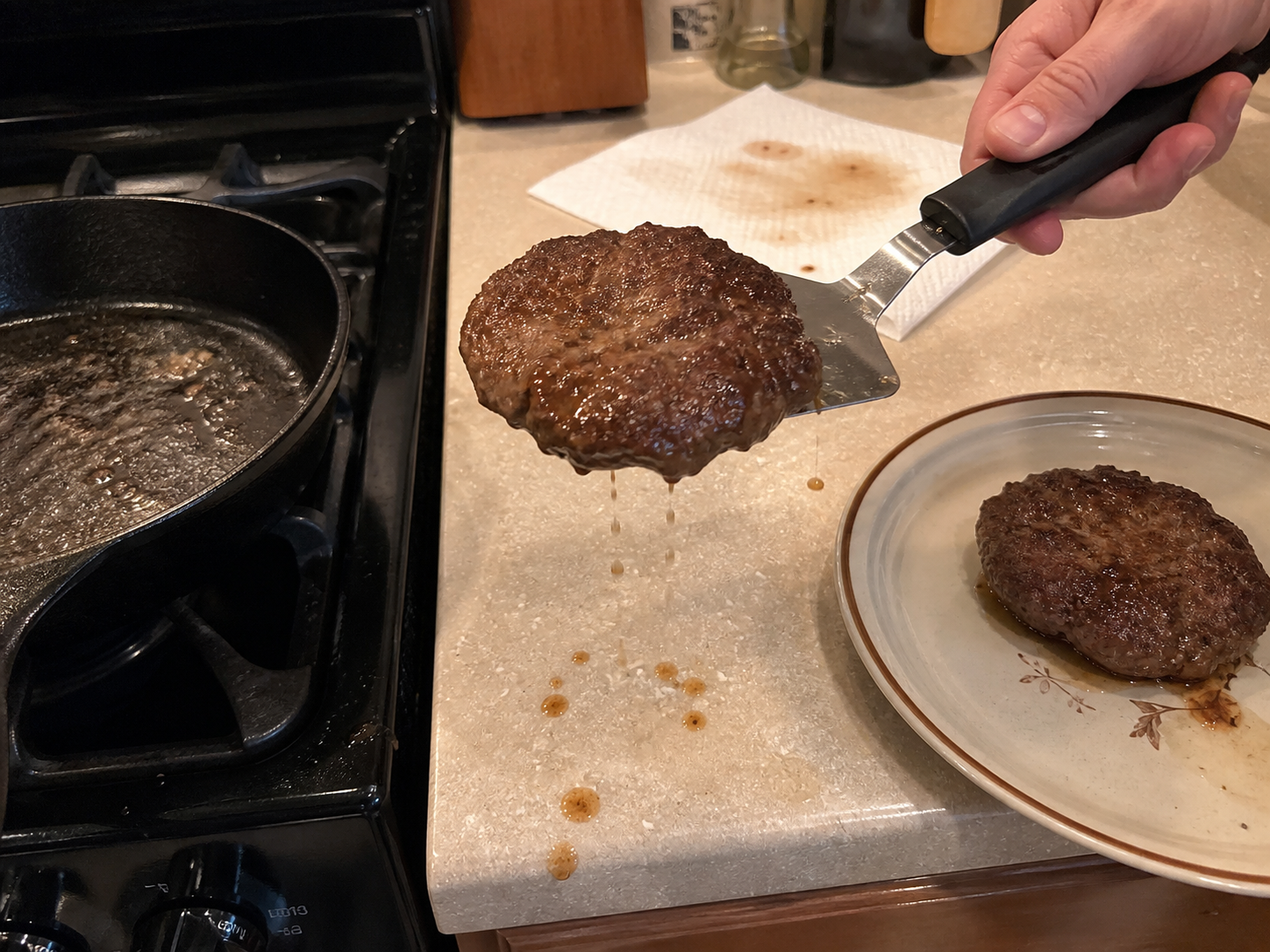 Oil dripping from food while moving it from the pan