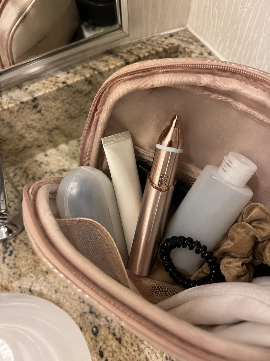 Dluvivo trimmer inside a travel makeup pouch