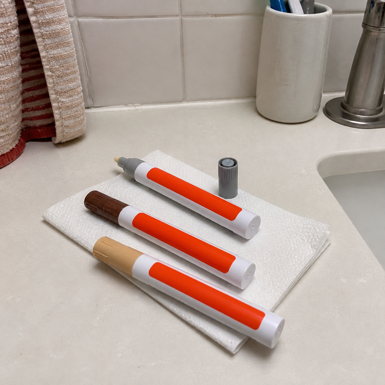 Customer multiple grout repair pen colors photo