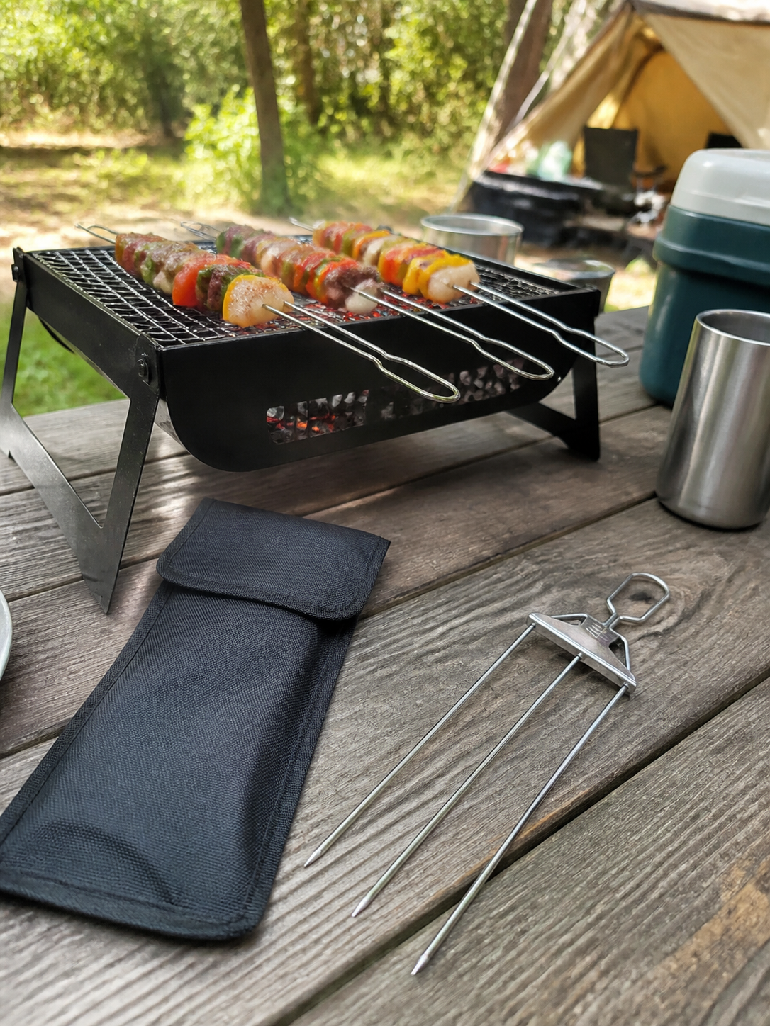 Camping grill with 3-way skewers and storage bag