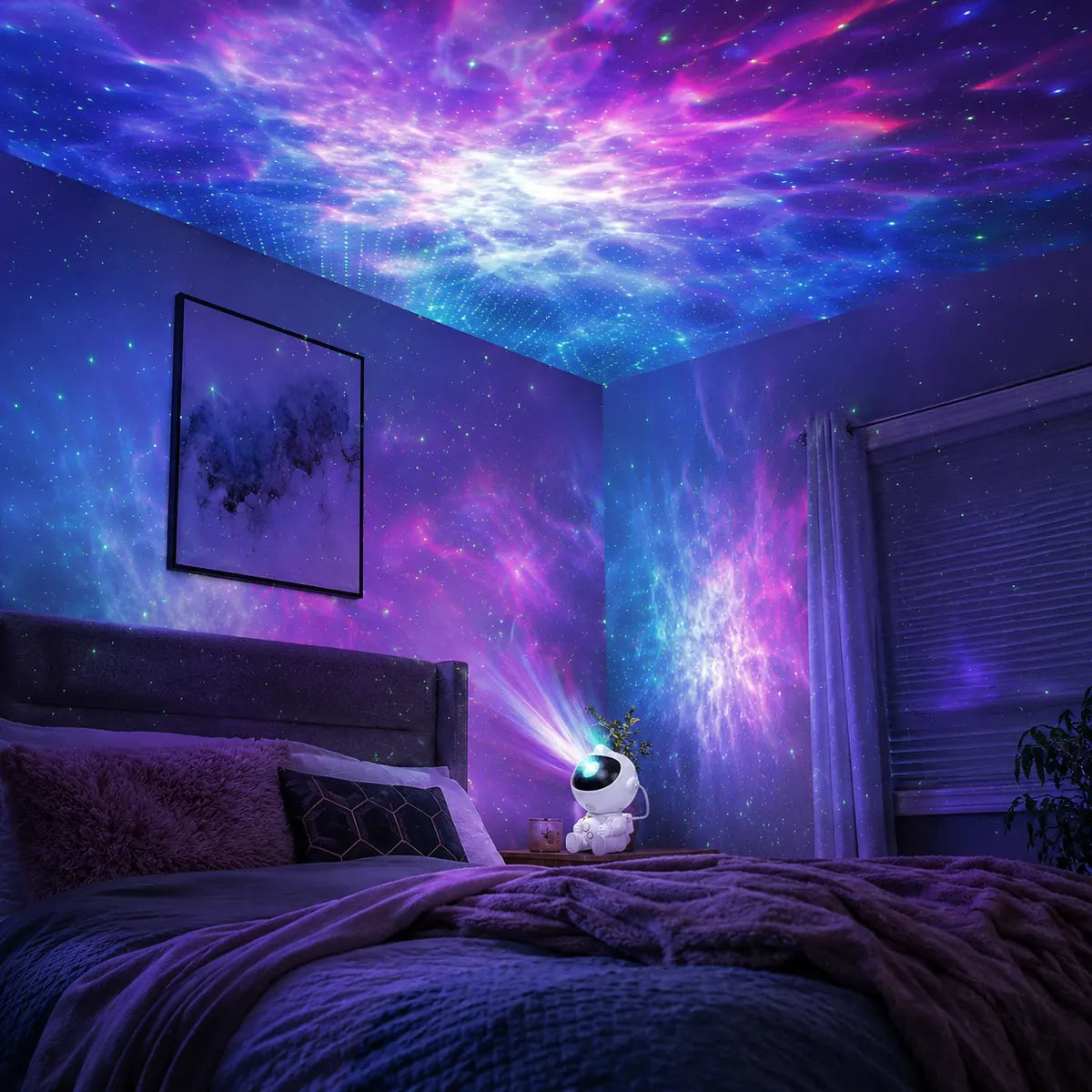 Our product creating a colorful galaxy star projection across a bedroom ceiling