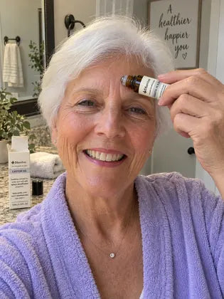 Cooling eye roller serum placed on a clean bedside table