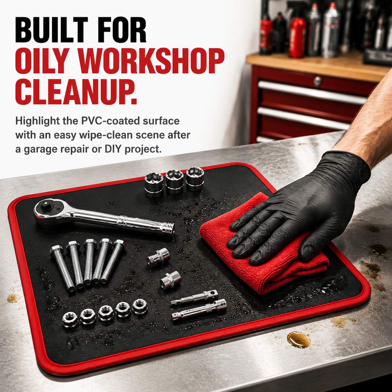 PVC-coated magnetic tool mat being wiped clean after oily workshop use.