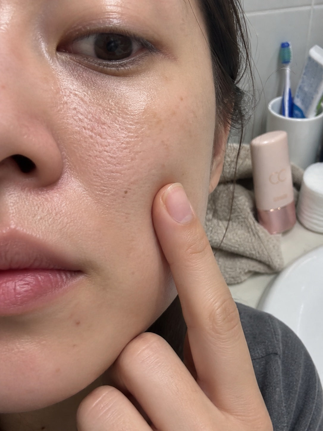 Illustrative close-up image of skin texture after tinted serum application