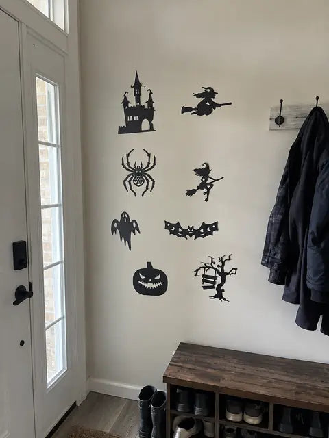 Customer entryway wall with Halloween silhouette decorations during daytime
