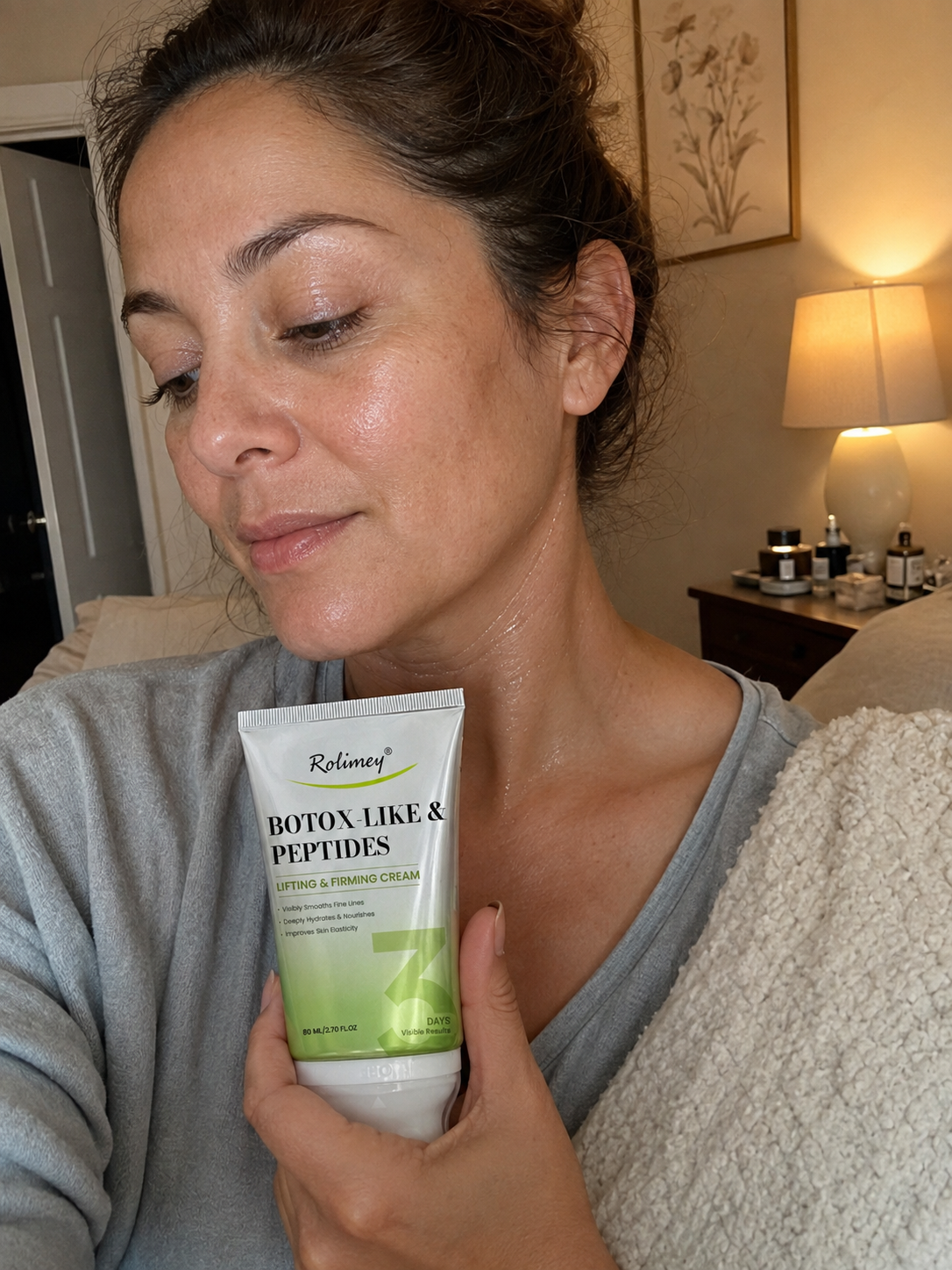 Customer applying Rolimey to neck