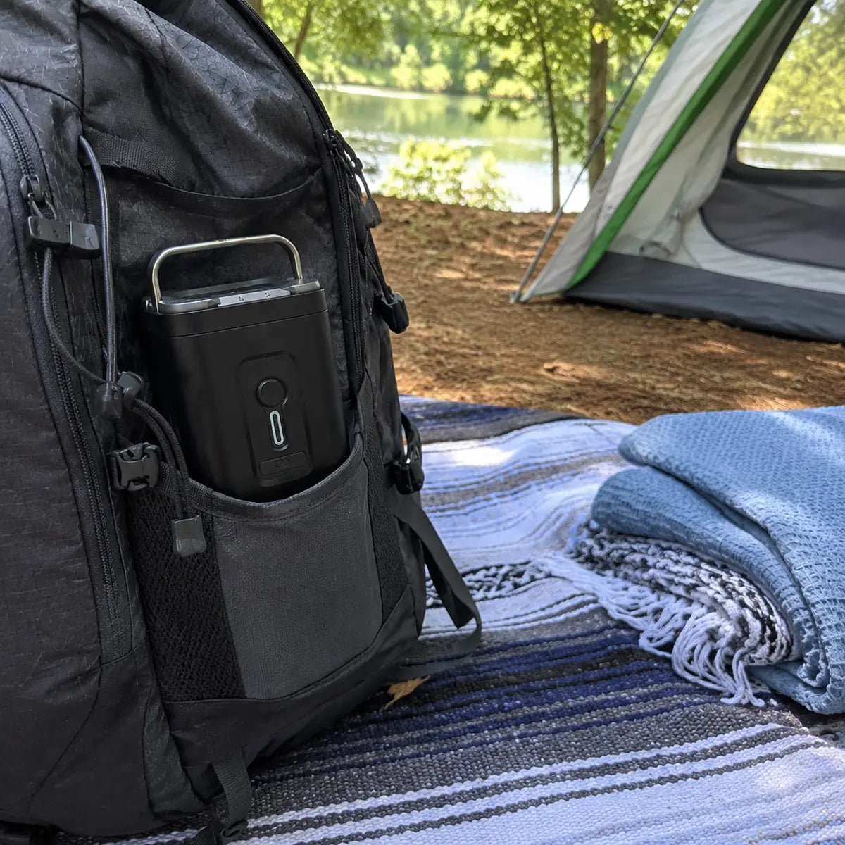 Maria G. customer photo: compact pump packed in a camping gear tote with storage bag and nozzles