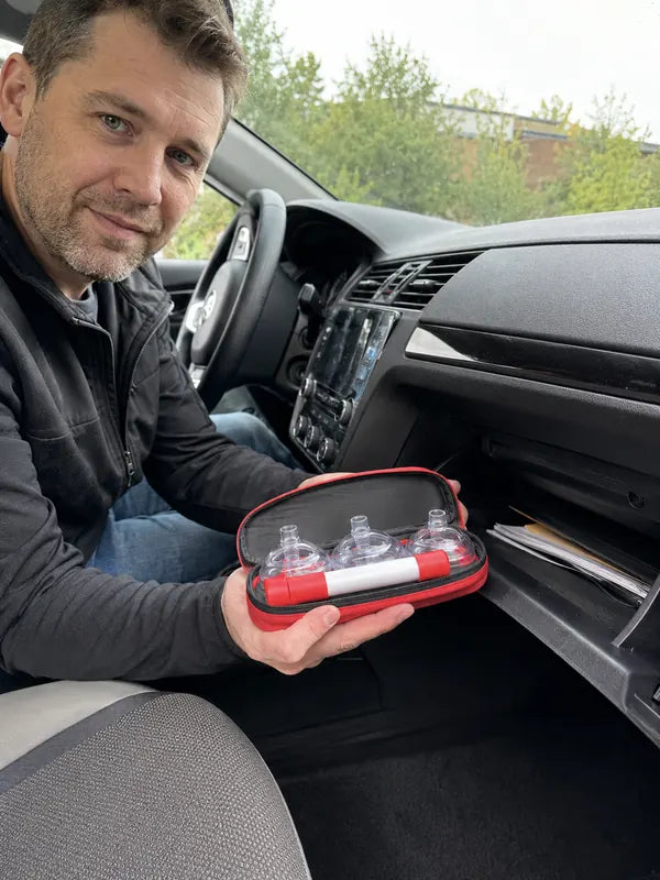 Jason Miller keeping the emergency choking relief kit in the car