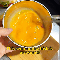 Hand-push rotary whisk mixing eggs demo