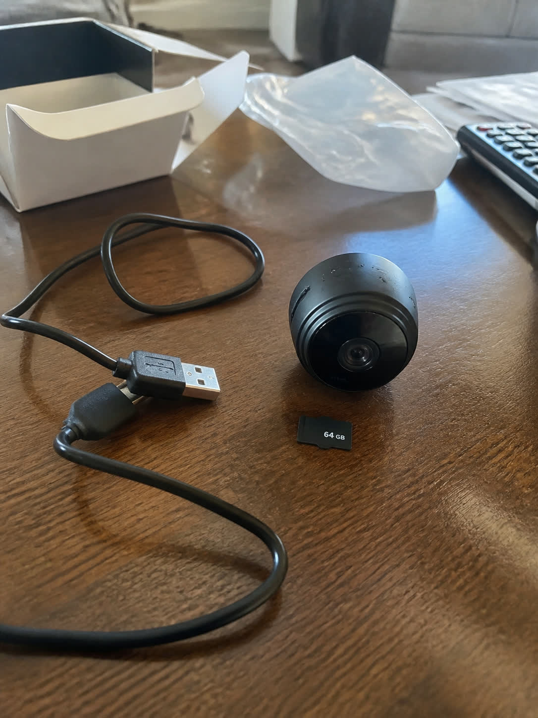 Mini pinhole camera with 64 GB memory card and USB cable